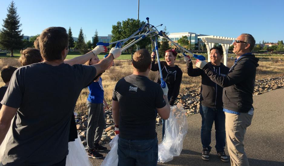 Group of Adopt-a-Creek volunteers cheering