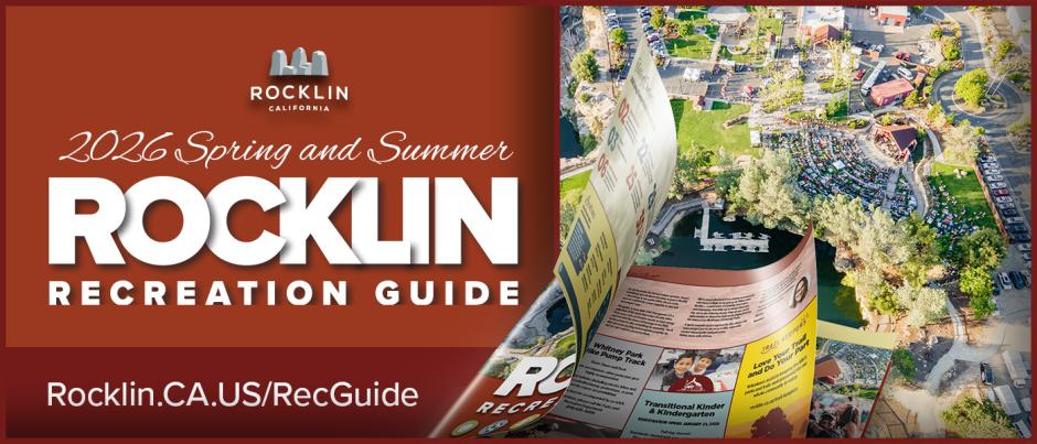 Promotional graphic for the 2026 Spring and Summer Rocklin Recreation Guide. The left side features a deep rust-red background with the City of Rocklin California logo at the top and large white text reading “2026 Spring and Summer Rocklin Recreation Guide.” At the bottom left, white text reads “Rocklin.CA.US/RecGuide.” The right side shows an aerial photo of Quarry Park Amphitheatre during a large outdoor event, with crowds seated on the lawn, surrounding trees, pathways, and parked cars visible. Overlaid on the aerial photo is a curved, page-turn style image of the printed Rocklin Recreation Guide, showing colorful program listings and photos, suggesting the guide opening or flipping pages.
