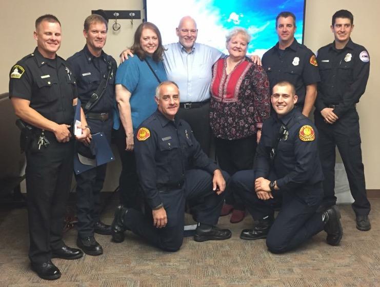 Cardiac arrest victim with the crew that successfully resuscitated him.