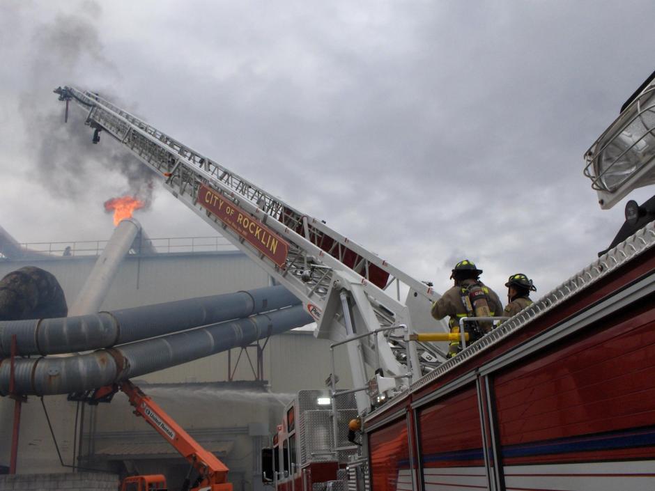 The current ladder truck at a firefighter training.