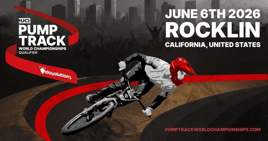 A wide horizontal promotional banner for the UCI Pump Track World Championships Qualifier. The background features a dark, gritty cityscape silhouette in deep grey tones with a crowd of spectators visible in the upper right, their arms raised in celebration. A bold red ribbon graphic sweeps diagonally across the left and center of the image, creating a dynamic sense of movement. On the left side, the official UCI Pump Track World Championships Qualifier logo is displayed in white text with the UCI rainbow stripe badge above it. Below the logo, the red Velosolutions brand logo is overlaid on the ribbon graphic. In the center foreground, a cyclist wearing a red full-face helmet and grey jersey is captured mid-race, leaning aggressively into a banked turn on a brown asphalt pump track. The rider and bike are rendered in a high-contrast, stylized graphic treatment that blends realism with a poster-like aesthetic. On the right side of the banner, bold white text reads "June 6th 2026" in a large headline font, followed by "ROCKLIN" in an even larger, dominant typeface, and beneath that "California, United States" in a slightly smaller weight. In the lower right corner, the website URL "pumptrackworldchampionships.com" is displayed in red text.