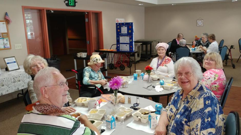 Seniors enjoy a free, nutritious meal and friendly faces at the Rocklin Café. Seniors First provides free lunches for seniors age 60 and over with the help of CDBG federal funds.