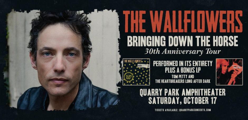 The Wallflowers Bringing Down the Horse 30th Anniversary Tour promotional banner featuring Jakob Dylan in a black denim jacket against a cream-colored wall on the left side. Right side displays "The Wallflowers" in large coral text, "Bringing Down the Horse" in white text, and "30th Anniversary Tour" in white script below. Two album covers are shown: the Bringing Down the Horse album with stars and a "W" emblem, and another album cover with red tones. Text reads "Performed in its entirety plus a bonus LP Tom Petty and The Heartbreakers Long After Dark" in white. Bottom displays "Quarry Park Amphitheater Saturday, October 17" in white text with "Tickets available: quarryparkconcerts.com" below against a dark textured background.