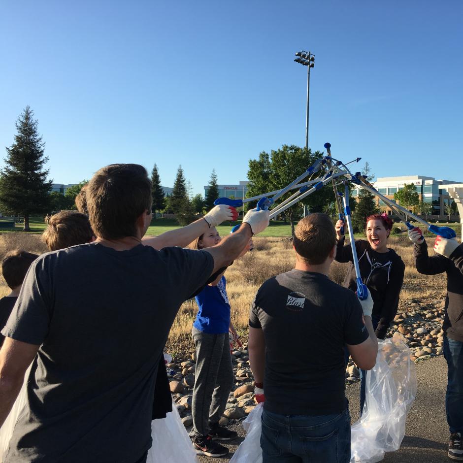 Group of Adopt-a-Creek volunteers cheering