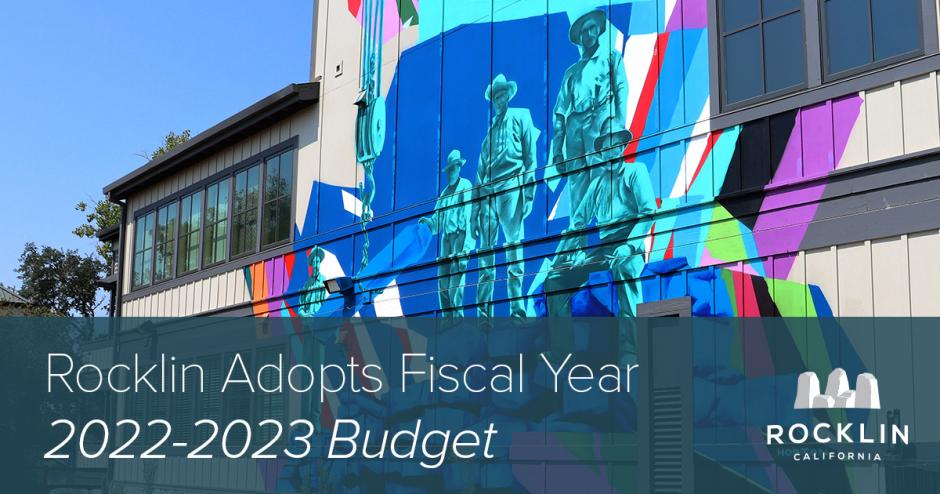 A visual header with a photo of the mural at the City Hall building (3970 Rocklin Rd), a colorful painting of Rocklin miners from the past. In front of the image is a headline "Rocklin Adopts Fiscal Year 2022-2023 Budget."
