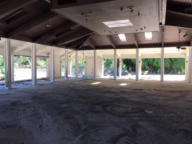 A second photo of demolition of the interior of an SWRA structure