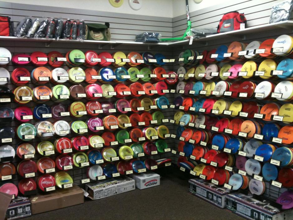 Discs of different colors and sizes line the walls at Final 9 Sports.