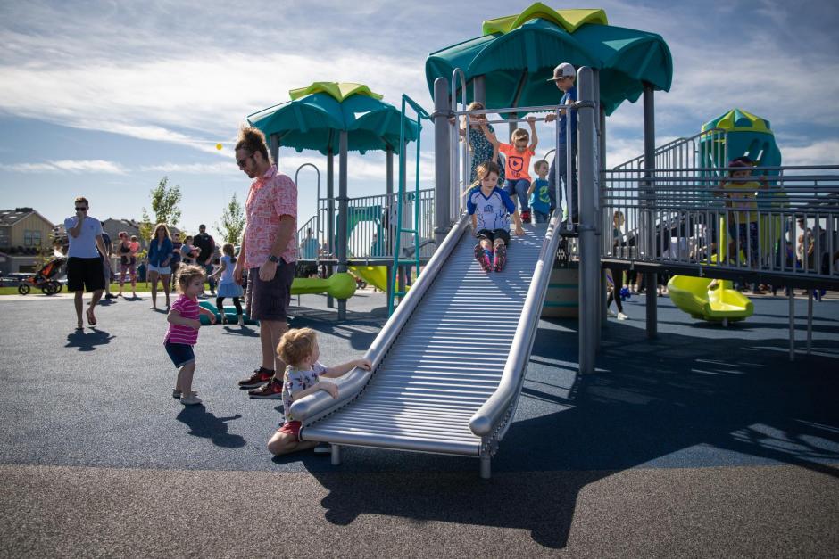 Children can't wait to take a turn down the slide.