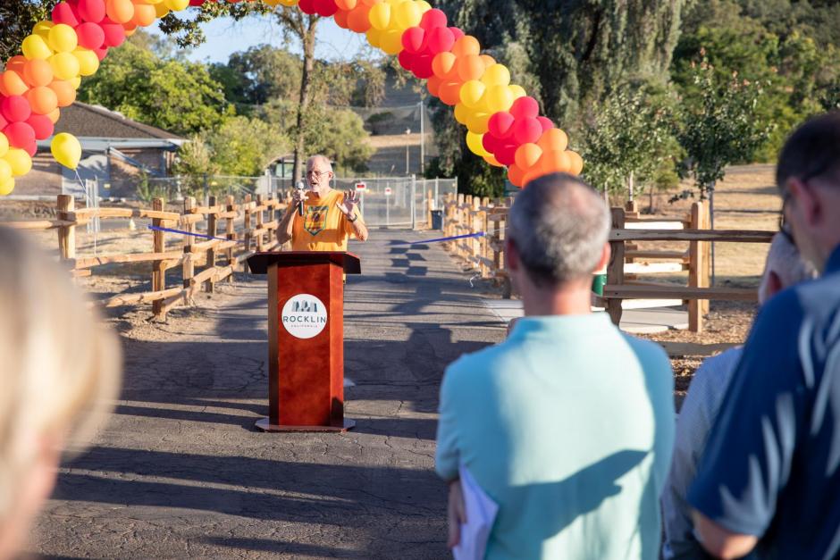 Trail Keeper Volunteer and Community Recognition Commission Chair Jerry Mitchell speaks at the SWRA West Trails opening. 