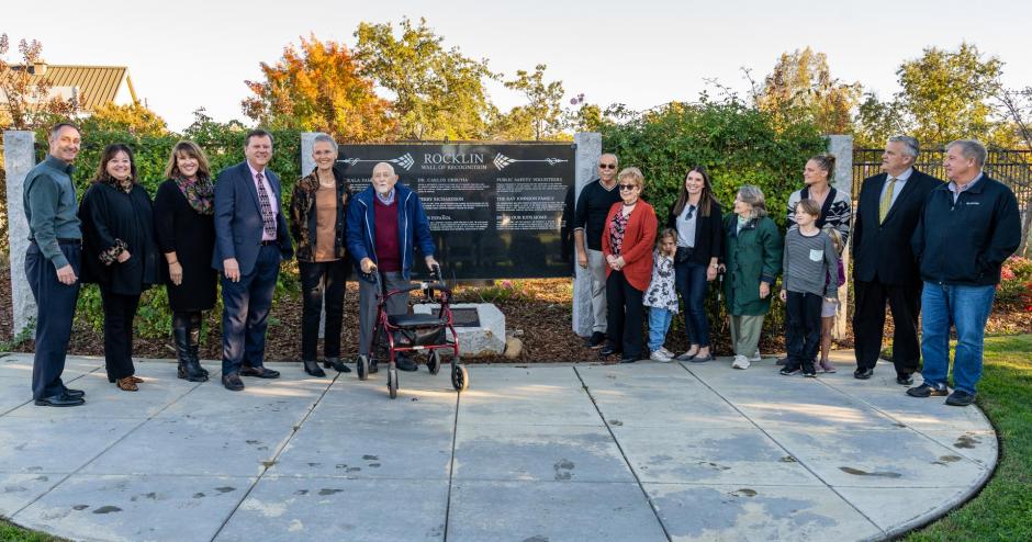 Representatives of Club Español and the Measure A “Bring Our Kids Home” campaign pose next to the Wall of Recognition in Rocklin, CA