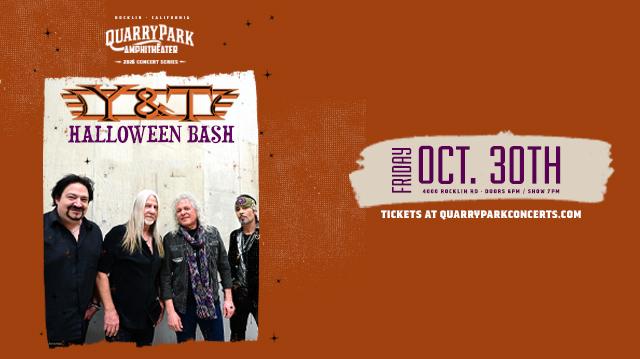 Concert poster for Quarry Park Amphitheater 2026 Concert Series featuring Y&T Halloween Bash on Friday, October 30th. Orange background with decorative stars. Four band members posed against a white weathered wall - one in black shirt, one with long blonde hair in black, one with gray hair in black leather jacket, and one in bandana and leather. Band logo features metallic orange striped lettering. Event details: 4000 Rocklin Rd, Doors 6PM, Show 7PM. Tickets at quarryparkconcerts.com.